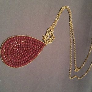 Long gold and burgundy necklace